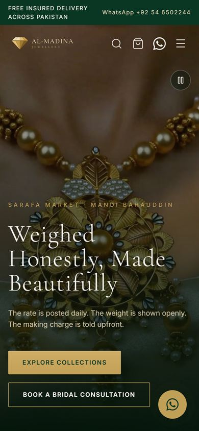 Al-Madina Jewellers homepage on a mobile phone