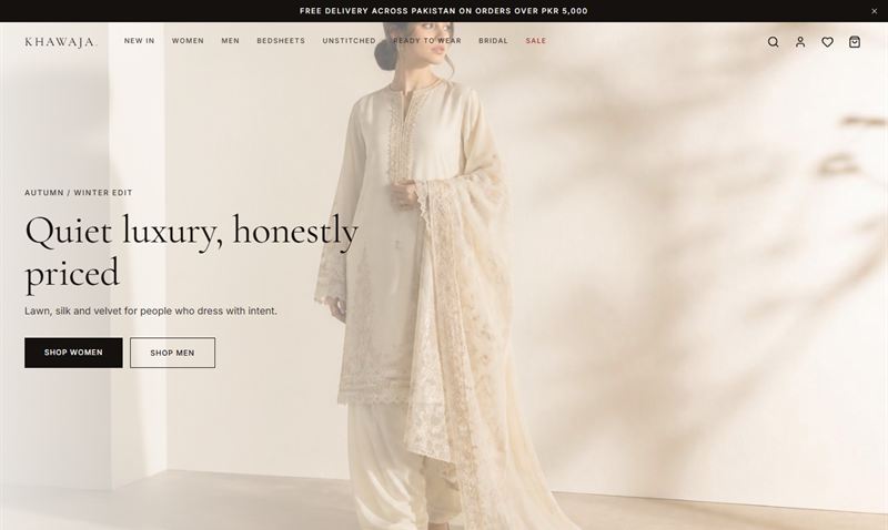 Khawaja Collection homepage with a model in a cream embroidered suit and the headline “Quiet luxury, honestly priced”